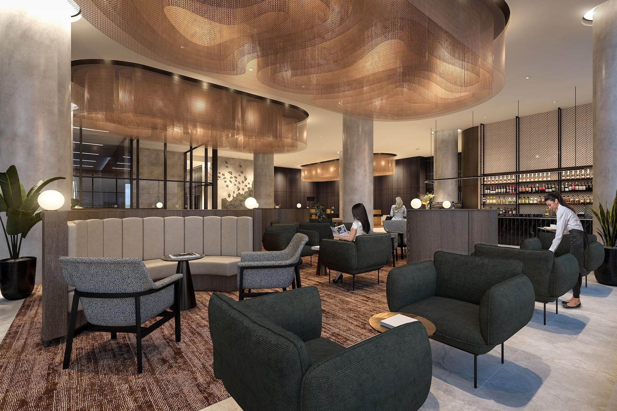 Oakwood Premier Melbourne Aparthotel Buitenkant foto The lounge at the airport